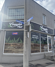 Cannabis Hut storefront on Lakeshore Road East in Mississauga with signage and open display window