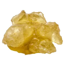 Close-up of Endgame Alien Godfather diamonds and sauce cannabis concentrate with golden crystalline texture.