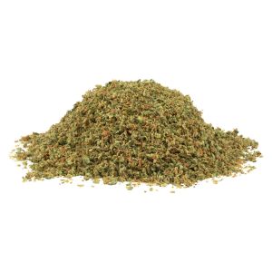 Close-up of SHRED Gnarberry milled cannabis flower showing finely ground green buds with orange pistils.