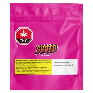 SHRED Gnarberry 14g milled cannabis flower package with pink pouch and THC warning label