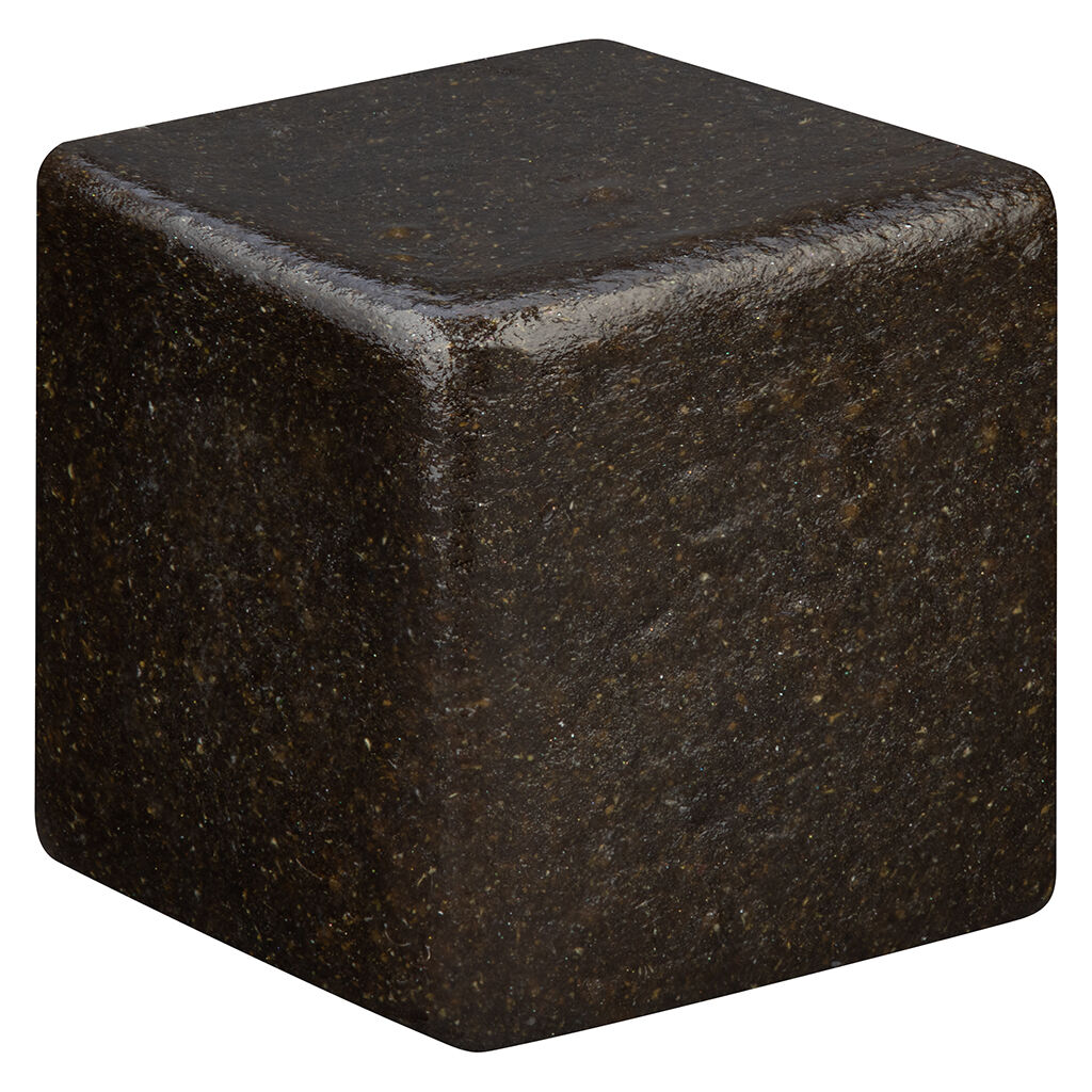 Close-up of Tremblant Afghan Black Hash block with dark, dense, pressed texture.